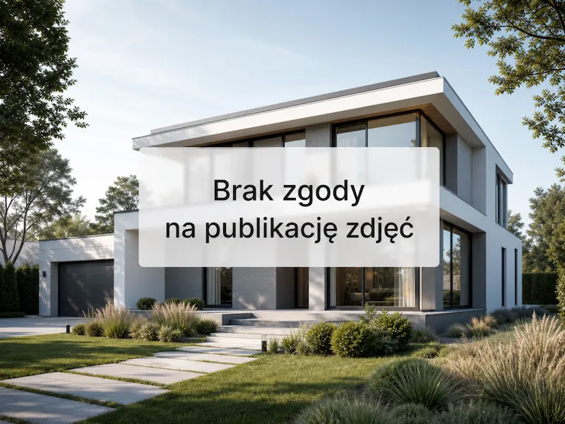 kompaktowy dom murowany z dachem płaskim